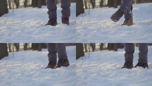 男人用慢动作踢雪高清在线视频素材下载