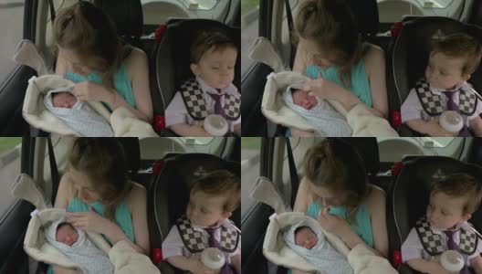 妈妈和两个孩子在车里高清在线视频素材下载