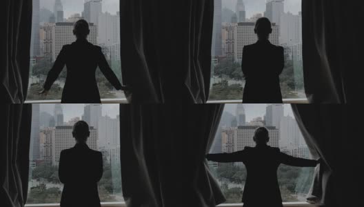慢镜头剪辑的女人打开窗帘的观点，香港，中国高清在线视频素材下载