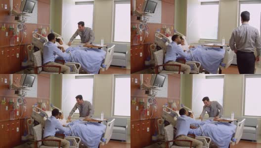 儿科医生在医院探访父亲和孩子，用R3D拍摄高清在线视频素材下载