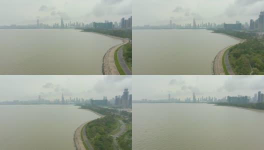白天的深圳城市景观。南山区城市天际线和海湾公园。中国空中拍摄高清在线视频素材下载