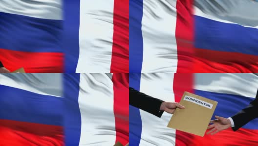 俄罗斯和法国官员交换机密信封，旗帜背景高清在线视频素材下载