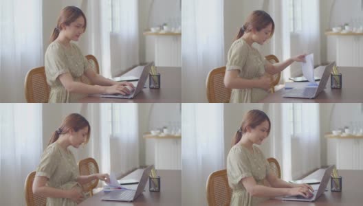 亚洲孕妇在家使用笔记本电脑工作高清在线视频素材下载