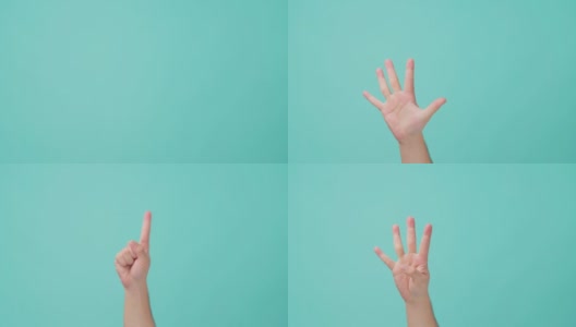 人的手举起的特写镜头，做手势用手指数1到5。用手掌打旗号或做手势的人。在孤立的蓝屏背景中看到。高清在线视频素材下载