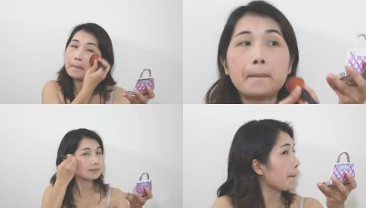 年轻女子化妆高清在线视频素材下载