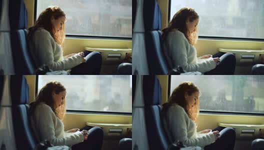 在火车上看书的女人高清在线视频素材下载