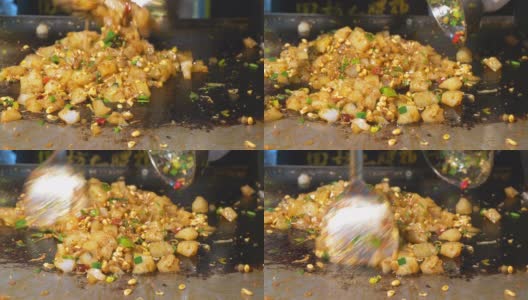 中国西安市惠民街的传统食品炒冻高清在线视频素材下载