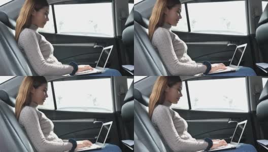 女人在车上用笔记本电脑高清在线视频素材下载