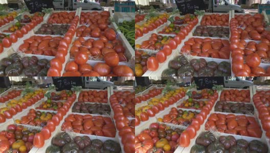 村民们在当地的蔬菜市场上出售不同种类的西红柿，进行贸易高清在线视频素材下载