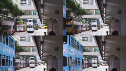 标志性的香港有轨电车概念。人们在电车站等候，后面有一辆车驶近高清在线视频素材下载