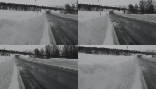 挪威暴风雪期间道路倾斜的照片高清在线视频素材下载