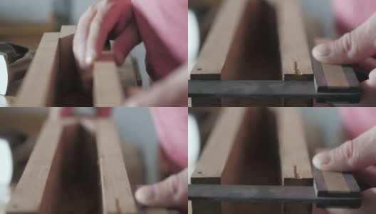 木匠用Try Square检查角度。试试古董木工工具。硬木木匠试方高清在线视频素材下载
