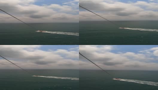 摩托艇在海上拉着降落伞高清在线视频素材下载