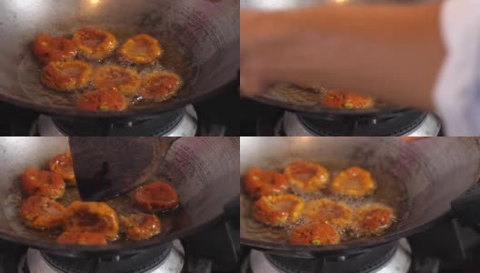 炸鱼丸或油炸鱼饼，制作炸鱼丸高清在线视频素材下载