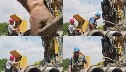 两名石油工人在钻井平台上工作高清在线视频素材下载