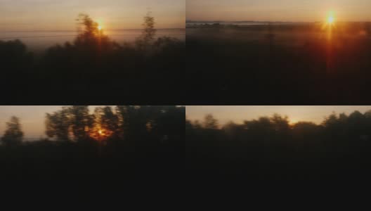 清晨的路上。从火车窗口望出去的景色——冉冉升起的太阳，山谷里的树木和雾气高清在线视频素材下载