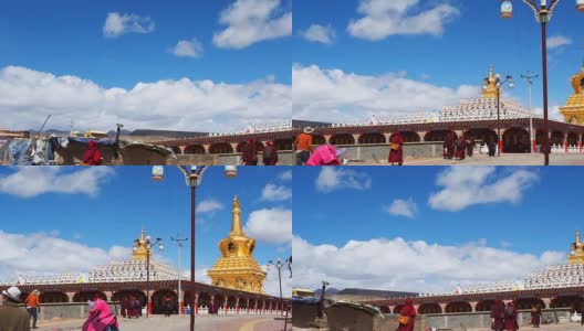 藏传佛教僧侣和尼姑行走在雅尔琴伽寺的宝塔上高清在线视频素材下载
