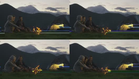 三个朋友在自然山户外露营的夜晚用篝火取暖的场景-高清视频片段高清在线视频素材下载