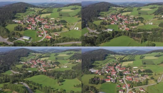 在格拉芬瑙附近的巴伐利亚森林中，从格鲁伯村向后的方向用无人机拍摄的缓慢飞行镜头高清在线视频素材下载