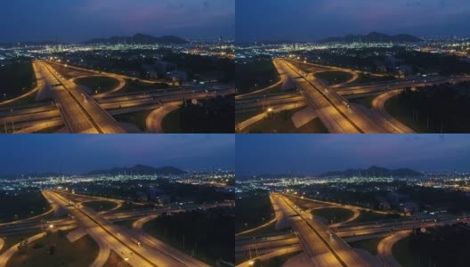 黄昏时分公路交通及炼油厂鸟瞰图高清在线视频素材下载