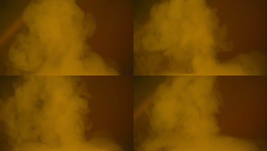 霓虹灯蒸汽烟雾背景。未来，超现实和抽象的背景与黄色移动的烟或蒸汽在夜总会的电力黑暗照明高清在线视频素材下载