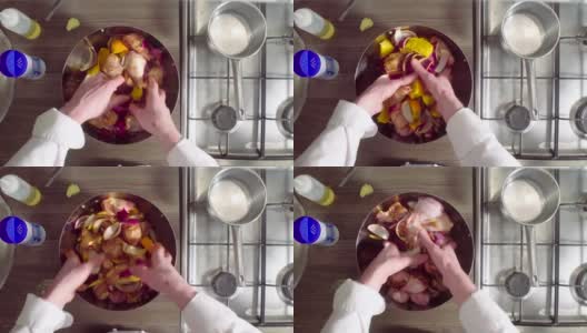 厨师用洋葱，生姜和橙子烹饪鸡肉高清在线视频素材下载