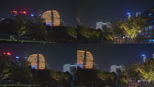 杭州市区夜景时间照亮了中国著名的现代建筑广场全景4k高清在线视频素材下载