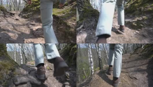 让徒步旅行者走在森林的小上坡路-鞋的特写高清在线视频素材下载