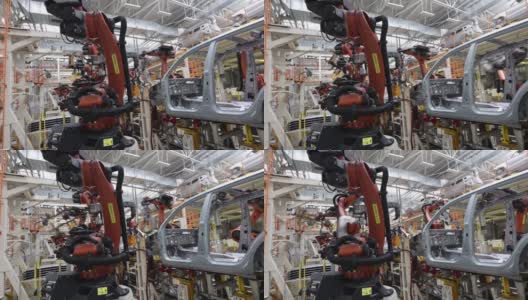 机器人自动组装汽车，现代化工厂的安全生产高清在线视频素材下载