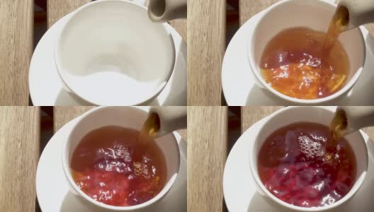 早上，茶杯放在木桌上的茶托上高清在线视频素材下载
