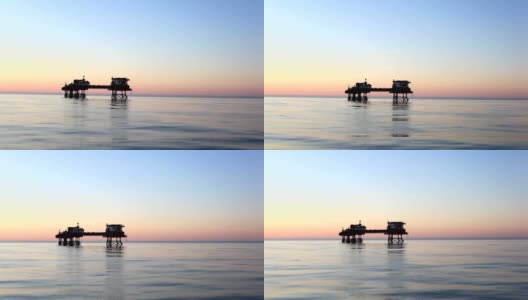 一个海上石油平台的剪影高清在线视频素材下载