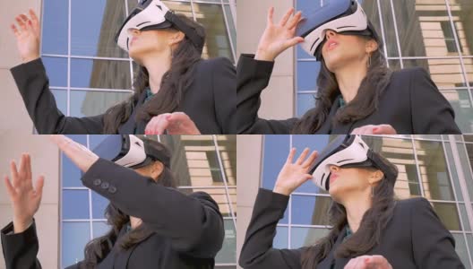 女商人戴着护目镜在虚拟现实世界中看着自己的手高清在线视频素材下载