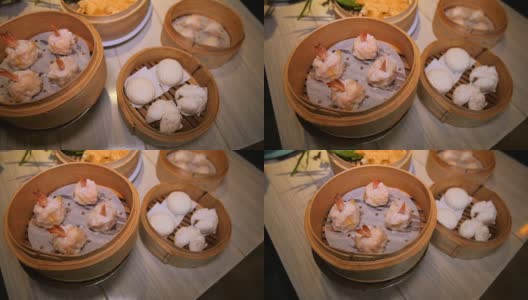 点心竹虾饺子餐厅桌上的精选。高清在线视频素材下载