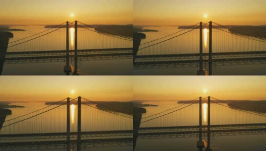 太阳向着塔科马海峡大桥上的地平线进发高清在线视频素材下载