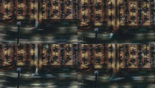 夜间室外停车场的无人机全景图高清在线视频素材下载