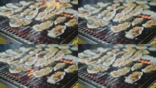 在夜市烤牡蛎高清在线视频素材下载