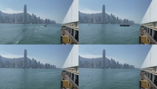 天星小轮在香港维多利亚港尖沙咀码头留下尾流高清在线视频素材下载