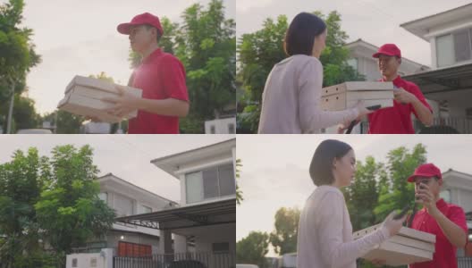 亚洲送货男工人穿着红色制服搬运食物，披萨给年轻漂亮的女顾客在房子前面。邮差和快递杂货配送服务理念高清在线视频素材下载