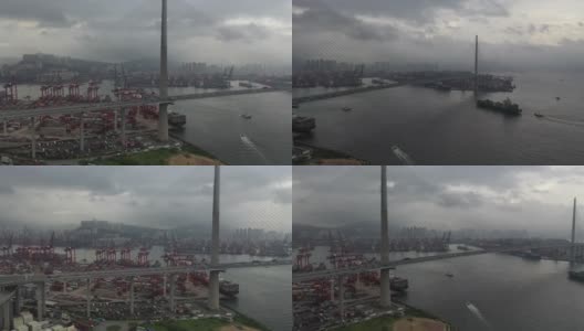 香港货柜码头及昂船洲大桥的交通车辆及货柜船坞的无人机电影高清在线视频素材下载