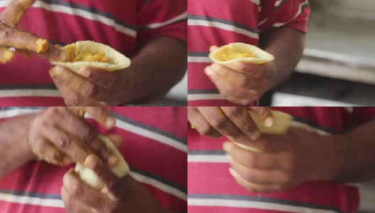 为准备印度著名小吃萨莫萨而制作或填充土豆泥高清在线视频素材下载