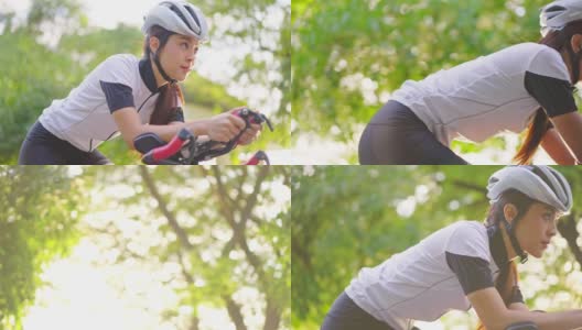 亚洲年轻美丽的女人骑自行车为健康在晚上在公共公园。运动员健康和坚定的女孩在运动服装锻炼通过自行车锻炼运动为她的健康健康。高清在线视频素材下载