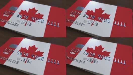 带有加拿大国旗的塑料银行卡。国家银行系统相关动画高清在线视频素材下载