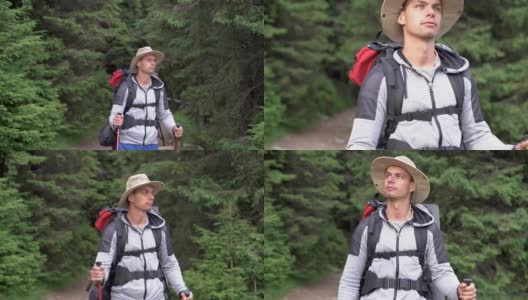 一个旅行者背着徒步旅行的背包和夹克在树林里散步。戴着帽子的人在森林里用登山手杖。男游客穿过树林。高清在线视频素材下载