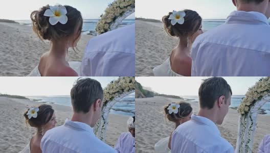 肖像的新娘持有婚礼花束和新郎在背景高清在线视频素材下载