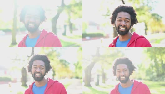 在明亮的阳光下无忧无虑的年轻黑人男子的肖像高清在线视频素材下载