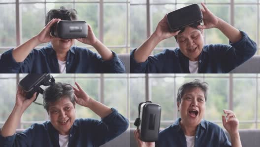 年长的亚洲妇女坐在家里的客厅里打完了虚拟现实眼镜，放下了就感到兴奋和满足。退休者学习新技术体验的概念。高清在线视频素材下载
