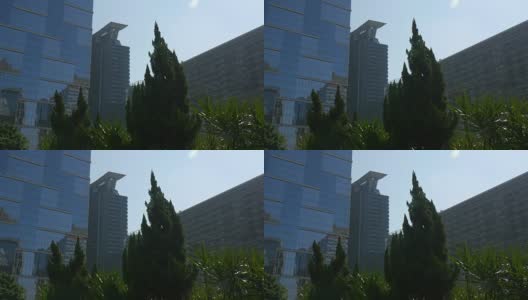 中国晴天澳门市区建筑正面反射4k全景高清在线视频素材下载