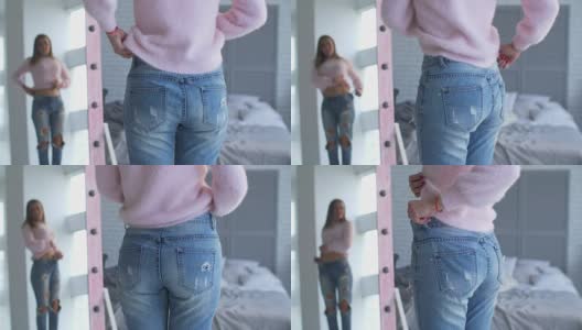 穿着牛仔裤减肥成功的女人高清在线视频素材下载