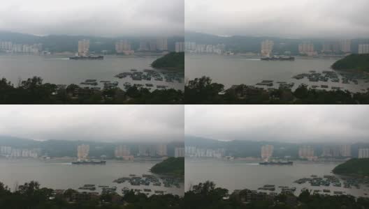一艘货船穿过香港马湾附近的东湾湾。四轴飞行器的全景图高清在线视频素材下载