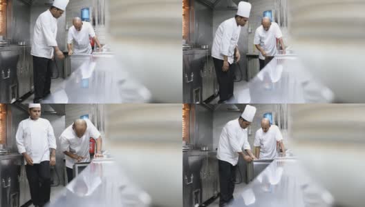 印度厨师在一个美食餐厅的专业厨房烹饪高清在线视频素材下载